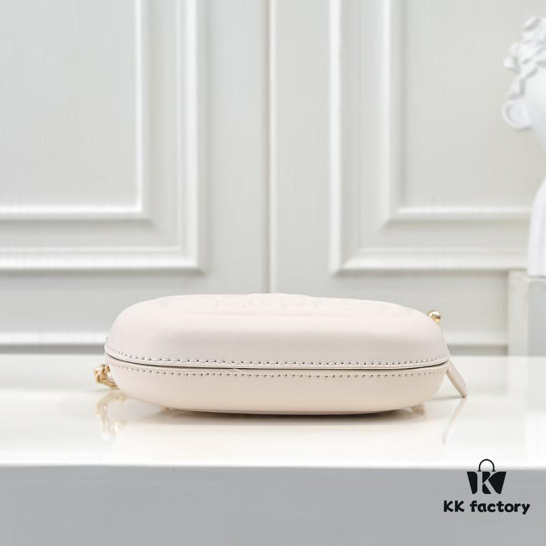 69304e50f09edb6de4c4e8b6 CHANEL 25C Pre-Spring Vacation Collection. Gold Mini Camera Bag