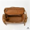 69304fb0f09edb6de4c4ea73 CHANEL 24K New Camera Bag - Elegantly Crafted with Lambskin and Metallic Chain