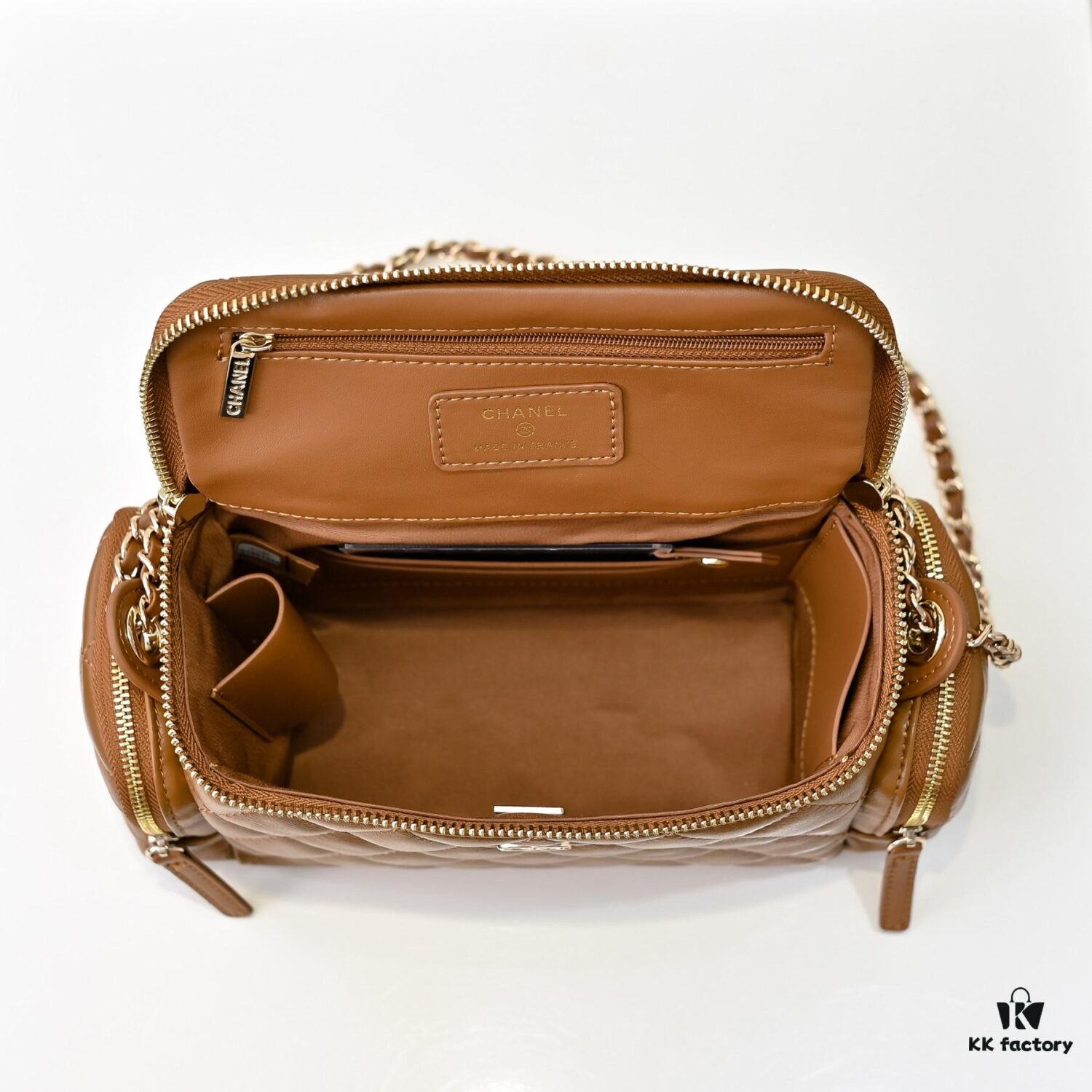 69304fb0f09edb6de4c4ea73 CHANEL 24K New Camera Bag - Elegantly Crafted with Lambskin and Metallic Chain
