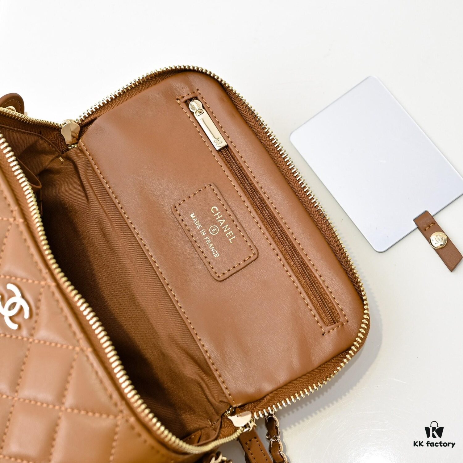 69304fb1f09edb6de4c4ea76 CHANEL 24K New Camera Bag - Elegantly Crafted with Lambskin and Metallic Chain