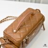 69304fb1f09edb6de4c4ea77 CHANEL 24K New Camera Bag - Elegantly Crafted with Lambskin and Metallic Chain