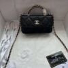 6930512df09edb6de4c4ec9c Chanel 24B New Collection WOC. Top-grain oiled waxed leather with braided handle, combining beauty and durability. Unique 'braided' metal chain handle composed of three separate chains forming a unified fixed handle. Small size: 17x10cm. Model number: 1211