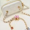 693051d8f09edb6de4c4ed58 Small Chanel 24A New Double C Enamel Buckle Makeup Pouch, Exquisitely Crafted in Imported Lambskin