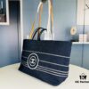 693051e4f09edb6de4c4ed65 Large New Arrival CHANEL Navy Striped Denim Beach Tote – The Perfect Companion for Vacation and Everyday Elegance