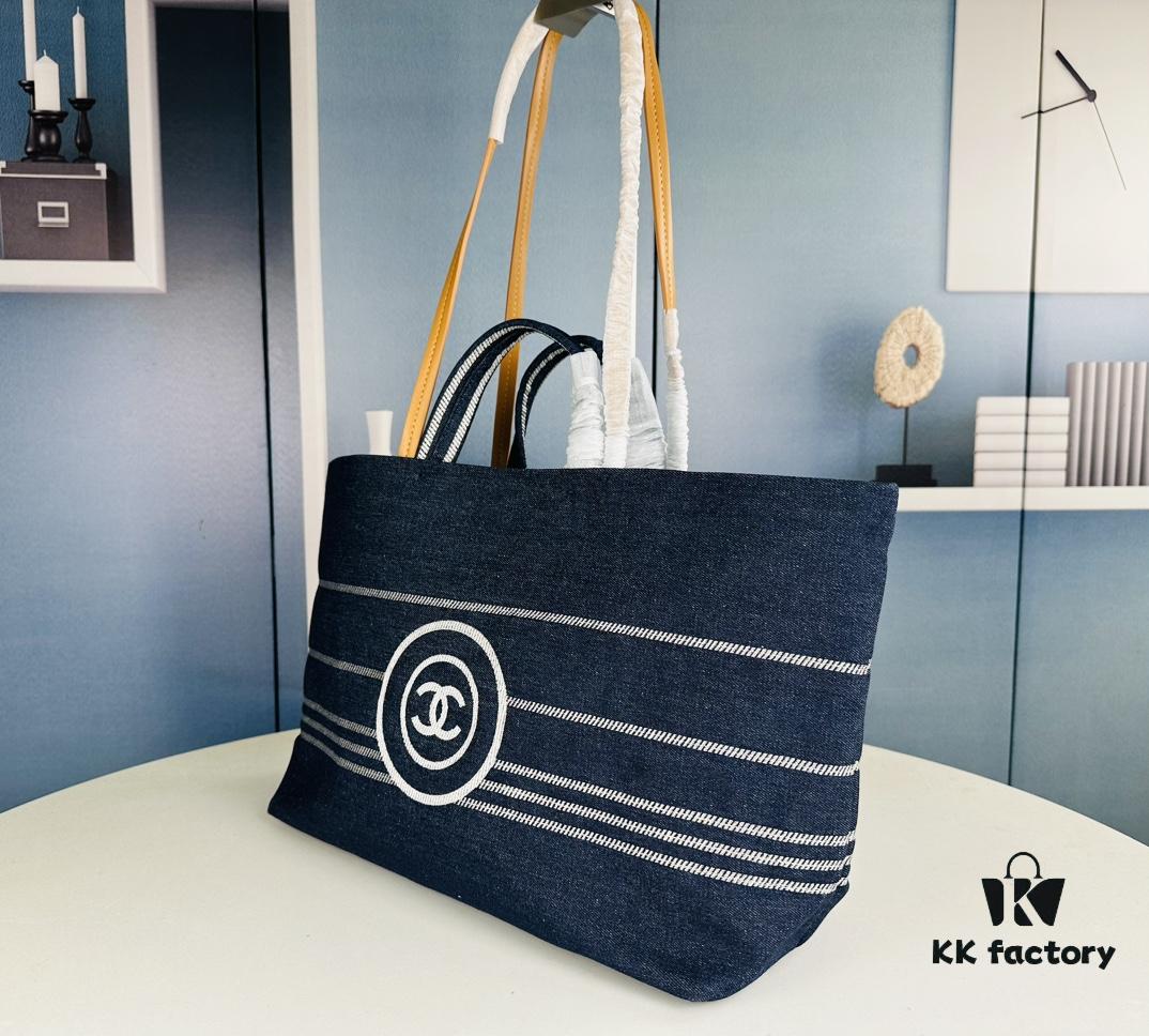 693051e4f09edb6de4c4ed65 Large New Arrival CHANEL Navy Striped Denim Beach Tote – The Perfect Companion for Vacation and Everyday Elegance