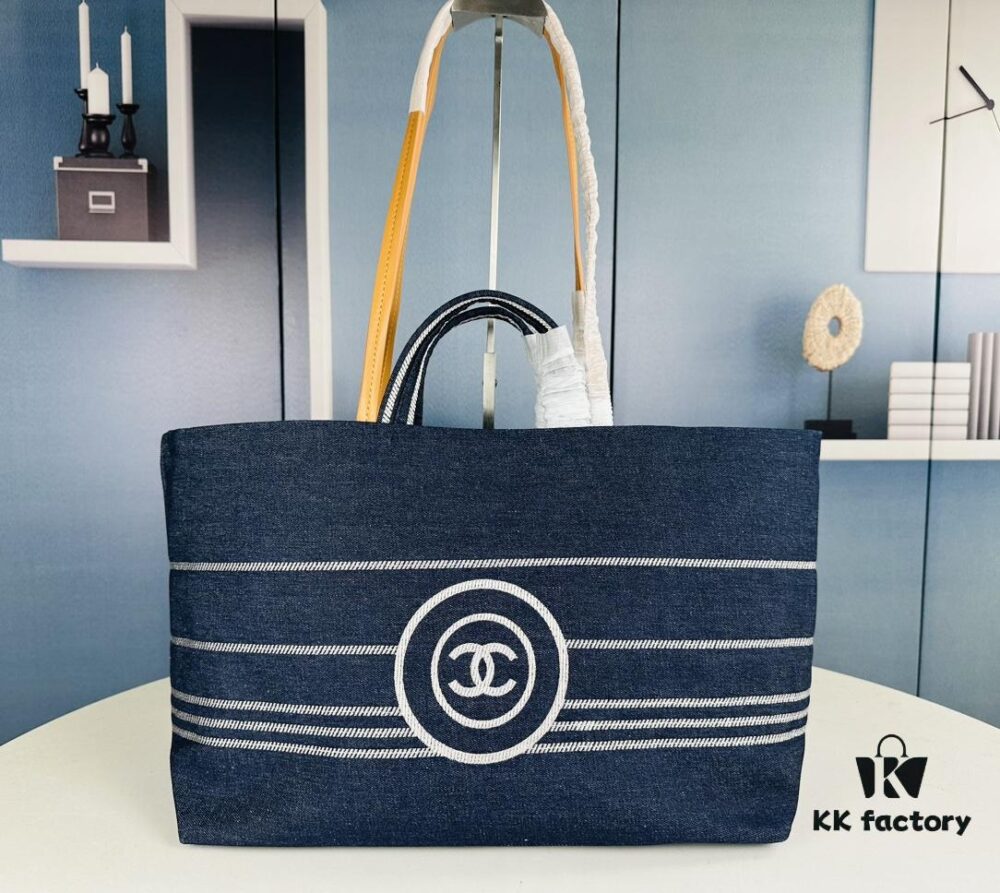 693051e4f09edb6de4c4ed67 Large New Arrival CHANEL Navy Striped Denim Beach Tote – The Perfect Companion for Vacation and Everyday Elegance