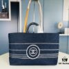 693051e4f09edb6de4c4ed67 Large New Arrival CHANEL Navy Striped Denim Beach Tote – The Perfect Companion for Vacation and Everyday Elegance