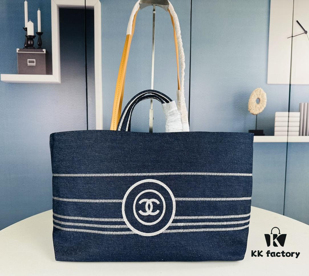 693051e4f09edb6de4c4ed67 Large New Arrival CHANEL Navy Striped Denim Beach Tote – The Perfect Companion for Vacation and Everyday Elegance