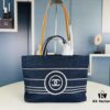 693051ebf09edb6de4c4ed71 Small-sized New Arrival CHANEL Navy Blue Striped Denim Beach Tote