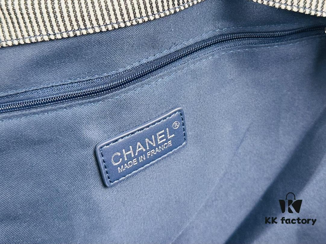 693051edf09edb6de4c4ed73 Large New Arrival CHANEL Navy Striped Denim Beach Tote – The Perfect Companion for Vacation and Everyday Elegance