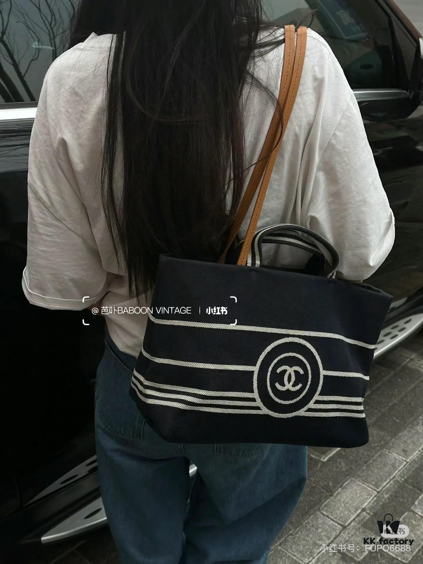 693051f3f09edb6de4c4ed7b Large New Arrival CHANEL Navy Striped Denim Beach Tote Bag