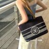 693051f9f09edb6de4c4ed80 Large New Arrival CHANEL Navy Striped Denim Beach Tote Bag