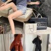 693051fcf09edb6de4c4ed83 Large New Arrival CHANEL Navy Striped Denim Beach Tote Bag