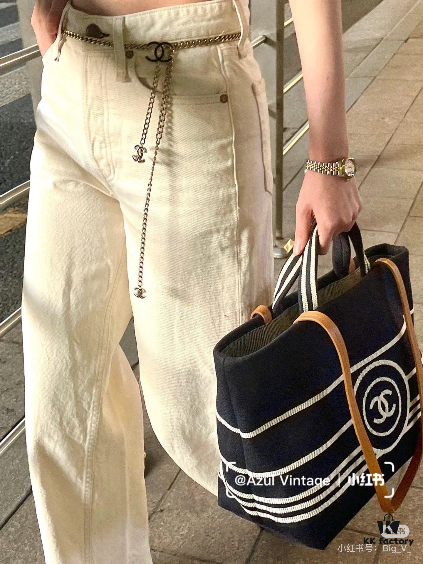 69305210f09edb6de4c4eda1 Large New Arrival CHANEL Navy Striped Denim Beach Tote Bag
