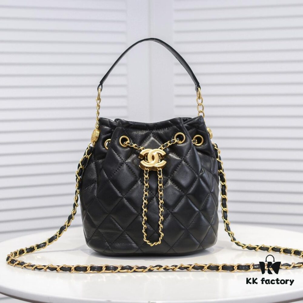 6930522cf09edb6de4c4edc8 Chanel Vintage Drawstring Button Bag Made of Lambskin with Classic Quilting and Chain-in-Leather Strap