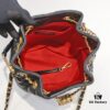 Chanel Vintage Drawstring Button Bag Made of Lambskin with Classic Quilting and Chain-in-Leather Strap