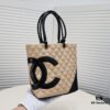 69305235f09edb6de4c4edd2 CHANEL 24A Spring/Summer Vintage Bag – Rare 2006 Never-Used Limited Edition! Iconic 'Hilton Basket' Design