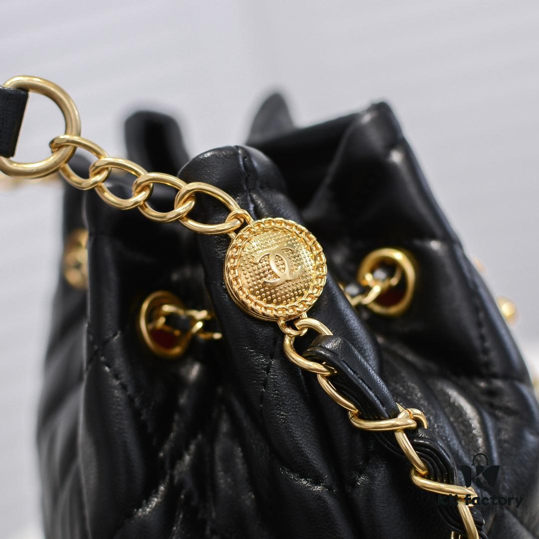 Chanel Vintage Drawstring Button Bag Made of Lambskin with Classic Quilting and Chain-in-Leather Strap