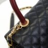 693052adf09edb6de4c4ee74 Black and Red Chanel-Style Shoulder Handbag with Unique Clasp Design, Dual Carry Options (Handheld or Crossbody), Premium Imported Full-Grain Calfskin with Lychee Texture, Upgraded Gold-Tone Hardware