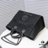 693052fbf09edb6de4c4eeeb Chanel Tote Bag - Spring and Summer Striped Canvas Beach Shopping Bag with Chain Detail