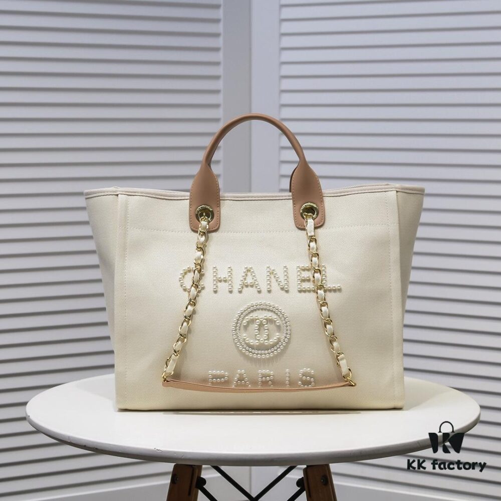 693052fef09edb6de4c4eeef Chanel Tote Bag - Striped Canvas Beach Shopping Bag with Chain, Resort Style for Spring and Summer