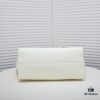 69305310f09edb6de4c4ef0d Chanel Tote Bag Spring and Summer Resort Style Canvas Beach Bag with Chain Stripes