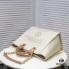 69305311f09edb6de4c4ef0e Chanel Tote Bag - Striped Canvas Beach Shopping Bag with Chain, Resort Style for Spring and Summer
