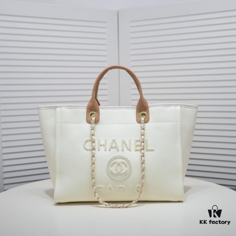 69305316f09edb6de4c4ef15 Chanel Tote Bag Spring and Summer Resort Style Canvas Beach Bag with Chain Stripes
