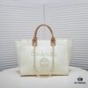 69305316f09edb6de4c4ef15 Chanel Tote Bag Spring and Summer Resort Style Canvas Beach Bag with Chain Stripes