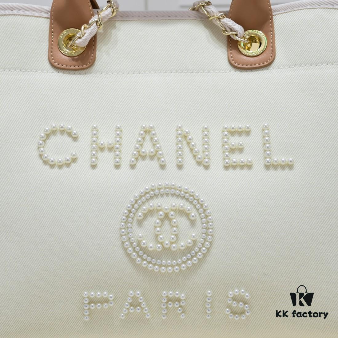 69305318f09edb6de4c4ef18 Chanel Tote Bag Spring and Summer Resort Style Canvas Beach Bag with Chain Stripes