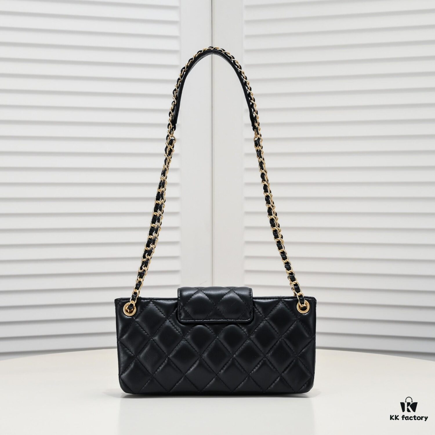 69305342f09edb6de4c4ef5c Chanel 24C Retro Large Logo Baguette Mini in Black Lambskin