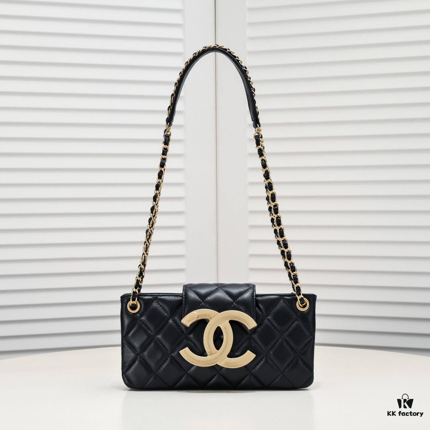 69305344f09edb6de4c4ef61 Chanel 24C Retro Large Logo Baguette Mini in Black Lambskin