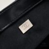69305346f09edb6de4c4ef63 Chanel 24C Retro Large Logo Baguette Mini in Black Lambskin