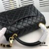 69305360f09edb6de4c4ef91 Large Black Chanel Unique Design Flap Bag – Dual Shoulder and Handheld Carry