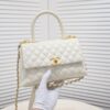 69305391f09edb6de4c4efd6 Medium White Chanel Flap Bag with Unique Design, Dual Carry Tote or Shoulder Style, Exquisite Craftsmanship