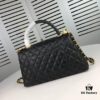 6930539df09edb6de4c4efe4 Medium Black Chanel Flap Bag with Unique Design, Dual Carry Tote and Shoulder Style