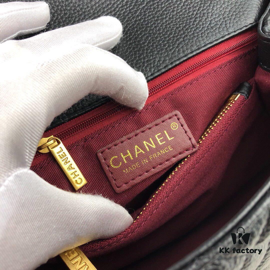 693053a2f09edb6de4c4efeb Medium Black Chanel Flap Bag with Unique Design, Dual Carry Tote and Shoulder Style