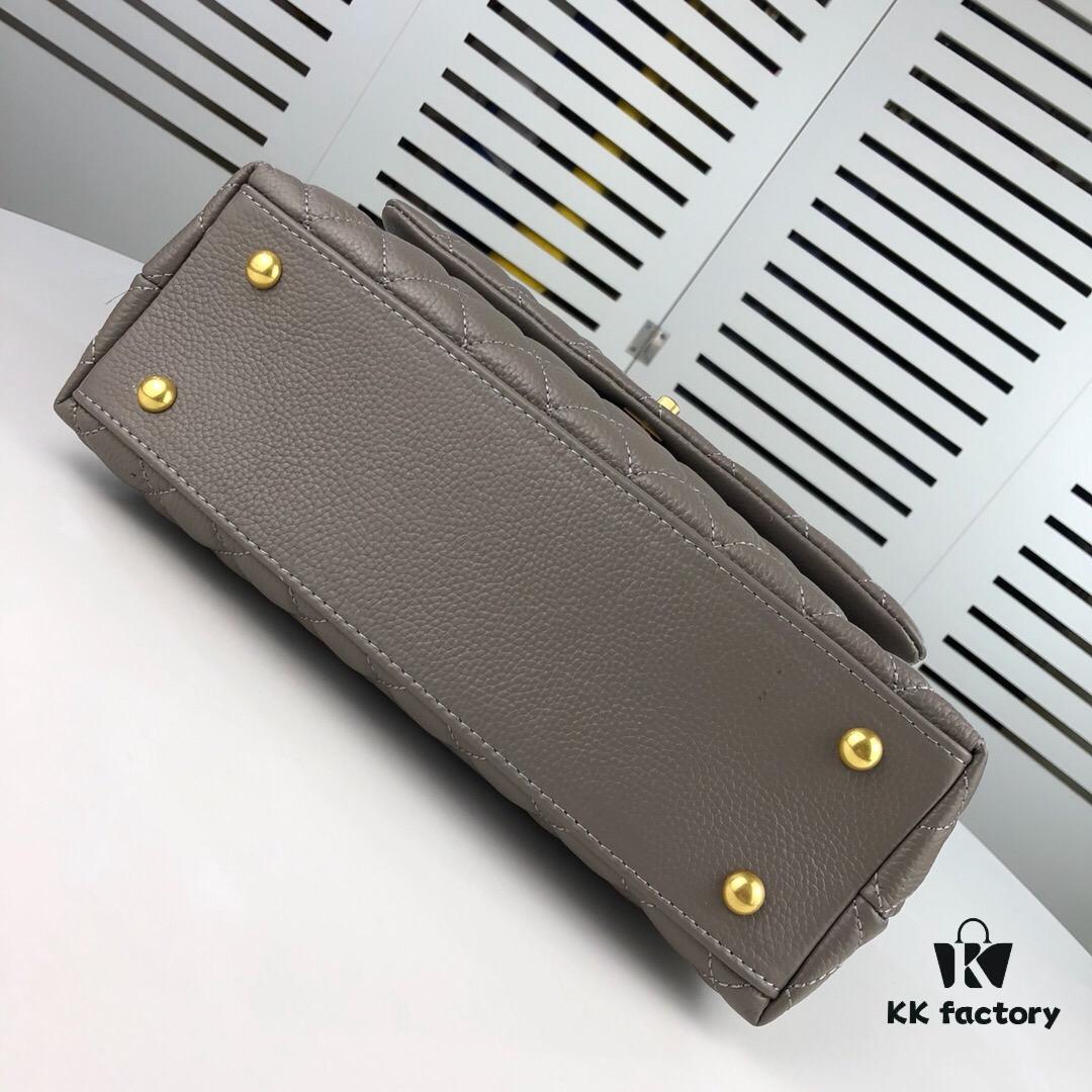 Medium Gray Chanel Flap Bag with Unique Design, Dual Shoulder and Top Handle Carry, Made from Imported Full-Grain Calfskin with Lychee Texture, Premium Gold-Tone Hardware