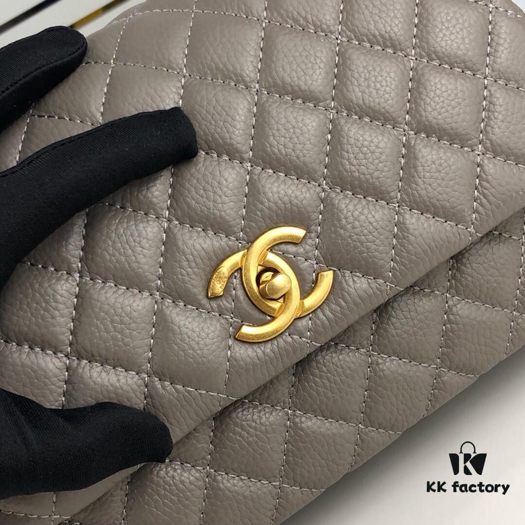 Medium Gray Chanel Flap Bag with Unique Design, Dual Shoulder and Top Handle Carry, Made from Imported Full-Grain Calfskin with Lychee Texture, Premium Gold-Tone Hardware