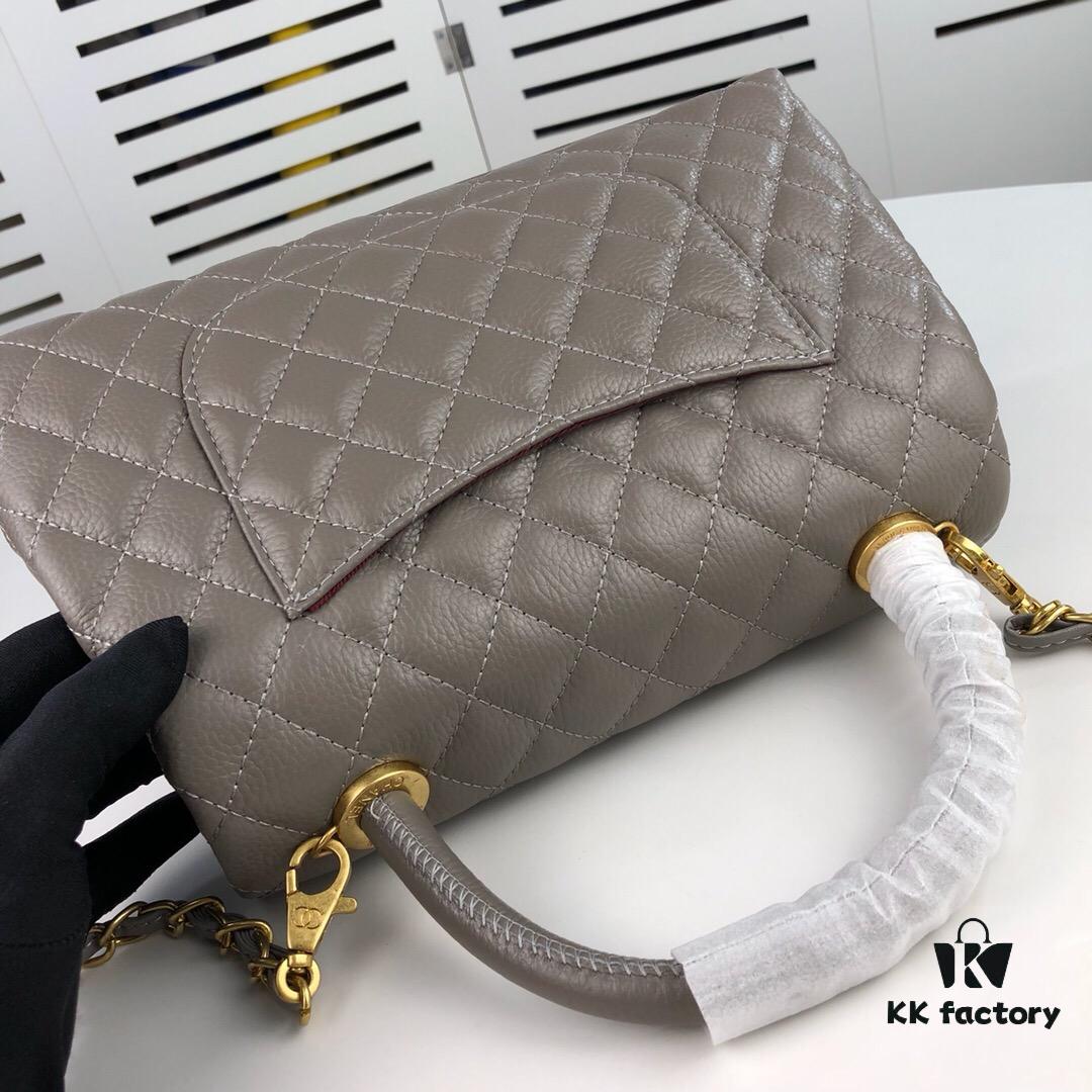 Medium Gray Chanel Flap Bag with Unique Design, Dual Shoulder and Top Handle Carry, Made from Imported Full-Grain Calfskin with Lychee Texture, Premium Gold-Tone Hardware