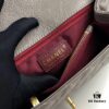 Medium Gray Chanel Flap Bag with Unique Design, Dual Shoulder and Top Handle Carry, Made from Imported Full-Grain Calfskin with Lychee Texture, Premium Gold-Tone Hardware