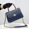 693053bef09edb6de4c4f00f Deep Blue with Red Accents Chanel-Style Flap Bag - Unique Design, Dual Shoulder and Handheld Use