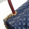 693053bff09edb6de4c4f010 Deep Blue with Red Accents Chanel-Style Flap Bag - Unique Design, Dual Shoulder and Handheld Use