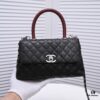 693053c7f09edb6de4c4f01b Chanel Unique Design Flap Bag with Shoulder and Top Handle - Dual Carry Style