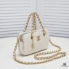 69305449f09edb6de4c4f0d0 Chanel 23K Gold Coin Chain Bag Vintage Style Fashionable and Versatile Handbag