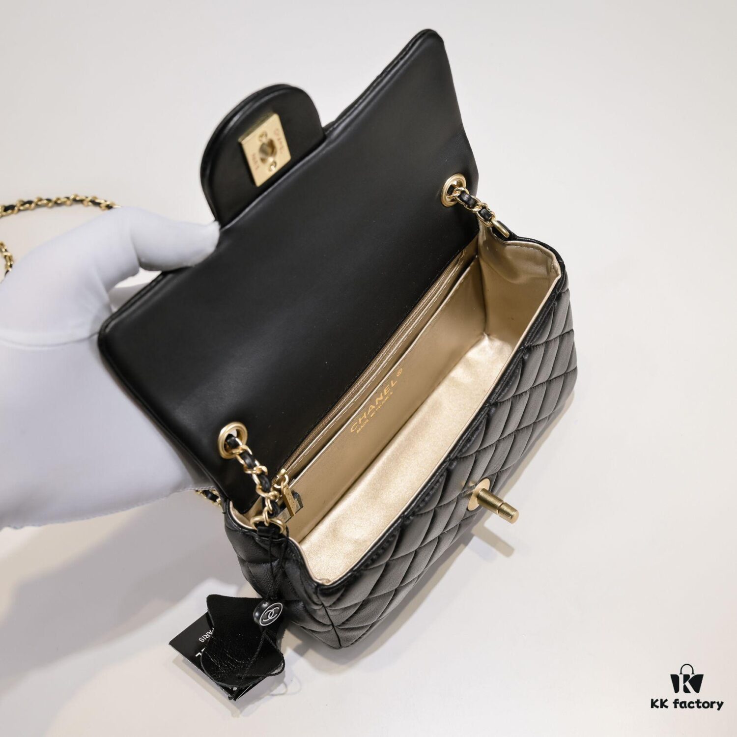 693054a5f09edb6de4c4f144 Chanel Hot-Selling Metal CF Mini Flap Bag with Hollow Woven Rope and Gold Ball Detail