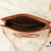 693057f6f09edb6de4c4f653 Upgraded Original M81366 Black and Caramel Chain Wash Bag Made from Natural Raffia with Black Leather Trim and Circle Logo