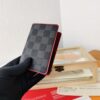 Top Quality Original 💎 [Photographed with Personal Background] N63144 Black Grid with Red, This Wallet Combines the Elegance of Damier Graphite Canvas and the Fine Texture of Epi Leather, Featuring Stripes Adorned with Louis Vuitton Signature Details
