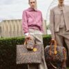 693058b4f09edb6de4c4f7a7 M24457 This Shopper Medium Bag Draws Inspiration from Louis Vuitton's Shopping Bags, Featuring 'Louis Vuitton' and 'Maison Fondée En 1854' Embossed on Soft Calfskin, with Top Handles and Detachable Shoulder Strap. Dimensions: 40x32x16cm