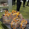 693058b5f09edb6de4c4f7aa M24457 This Shopper Medium Bag Draws Inspiration from Louis Vuitton's Shopping Bags, Featuring 'Louis Vuitton' and 'Maison Fondée En 1854' Embossed on Soft Calfskin, with Top Handles and Detachable Shoulder Strap. Dimensions: 40x32x16cm